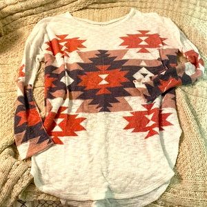 Mid thigh tunic. Perfect with leggings and boots!